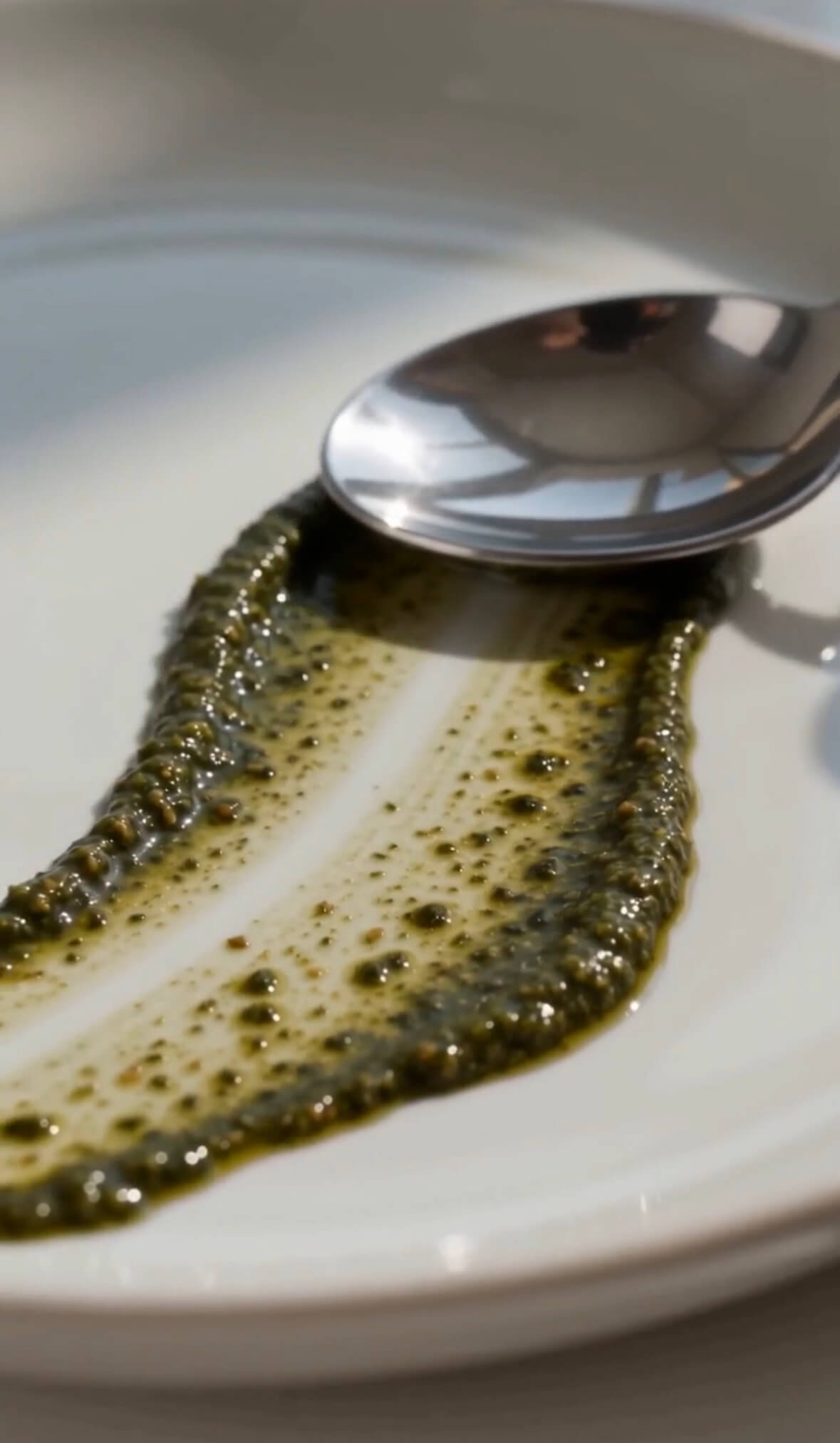 Spaghetti tossed with seaweed pesto, twirled on a fork